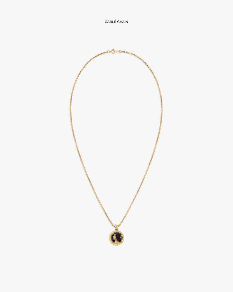 14Kt Gold Hera Pendant: Gold cable chain necklace with round pendant, black design on white background.