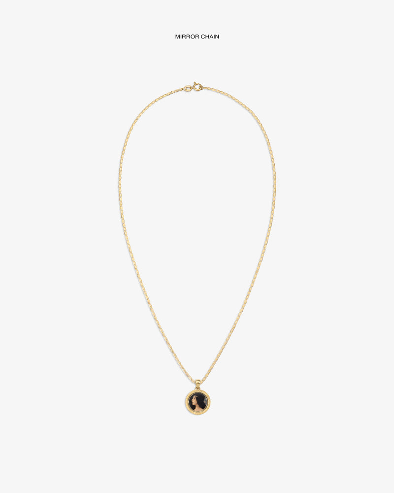 14Kt Gold Hera Pendant necklace with a round black and gold charm on a plain white background.