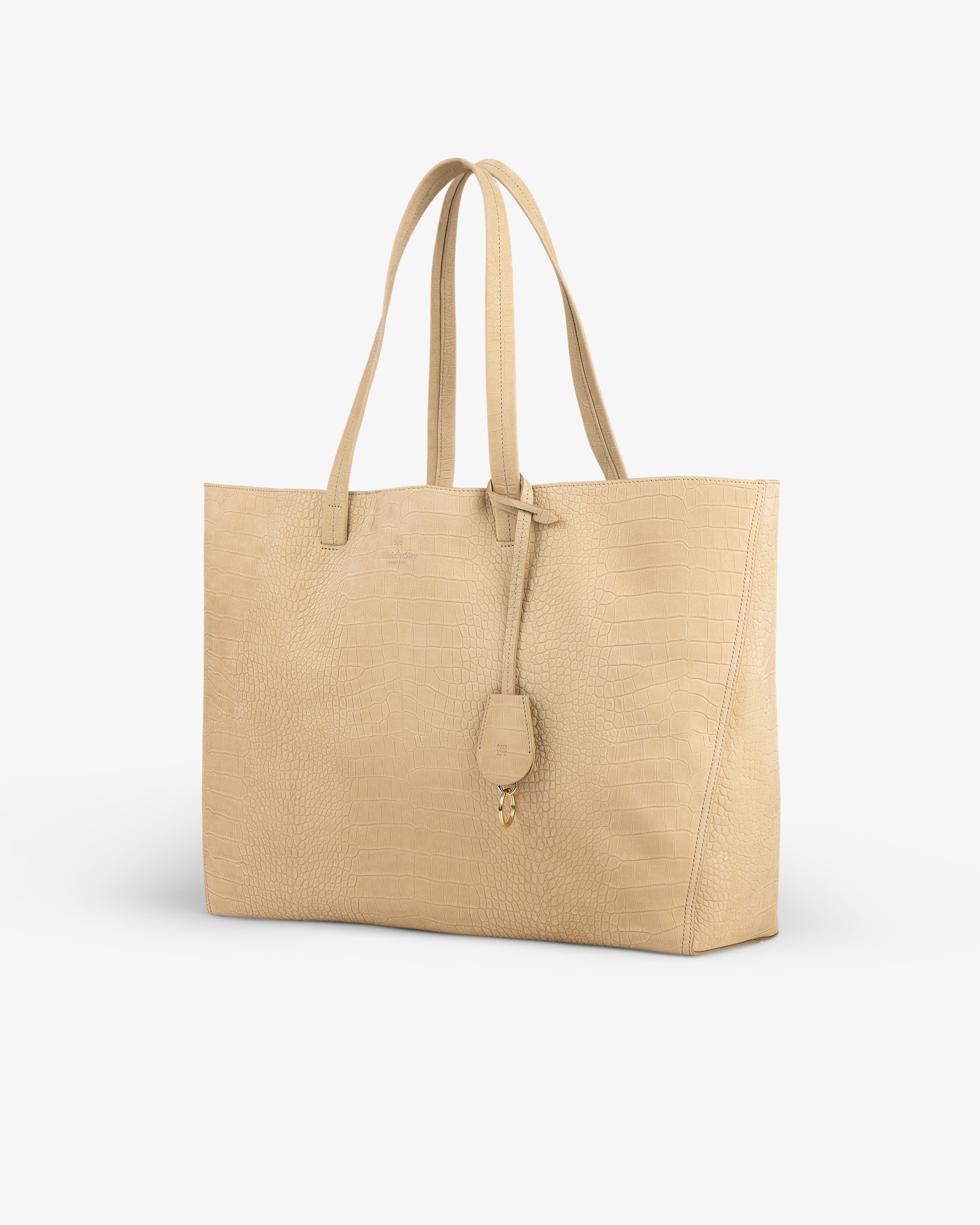 Croc-Embossed Nubuck Tote Bag with double handles and a decorative tag, on a white background.