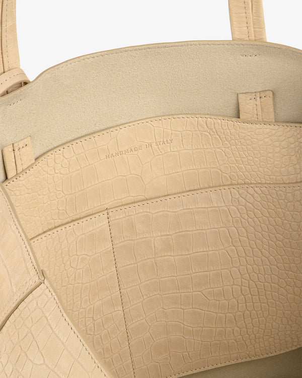 Close-up of Croc-Embossed Nubuck Tote Bag interior with HANDMADE IN ITALY stamped on the pocket.