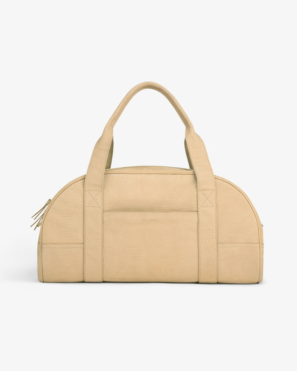 Croc-Embossed Nubuck Duffle with rounded top, two handles, and zip closure on a plain white background.