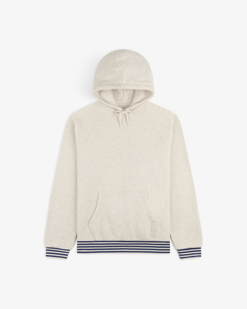 Dock Hoodie in beige with front pocket and navy striped cuffs and hem, shown flat on a white background.