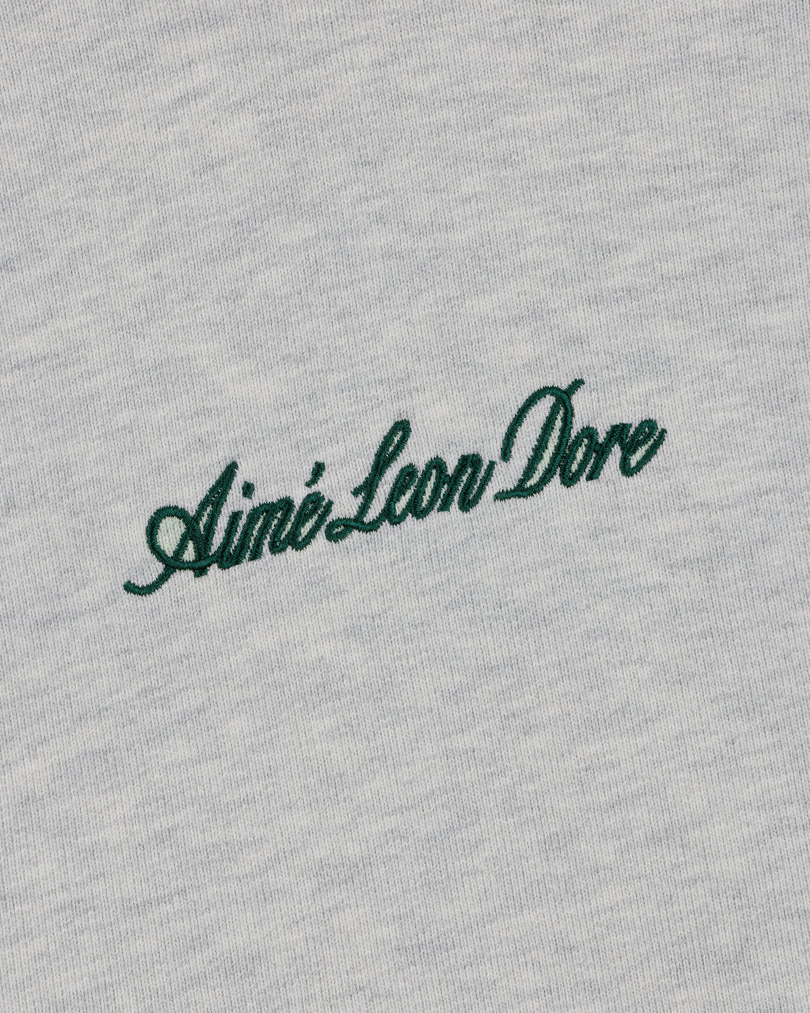 Green script "Aimé Leon Dore" embroidered on light grey Embroidered Logo Hoodie.