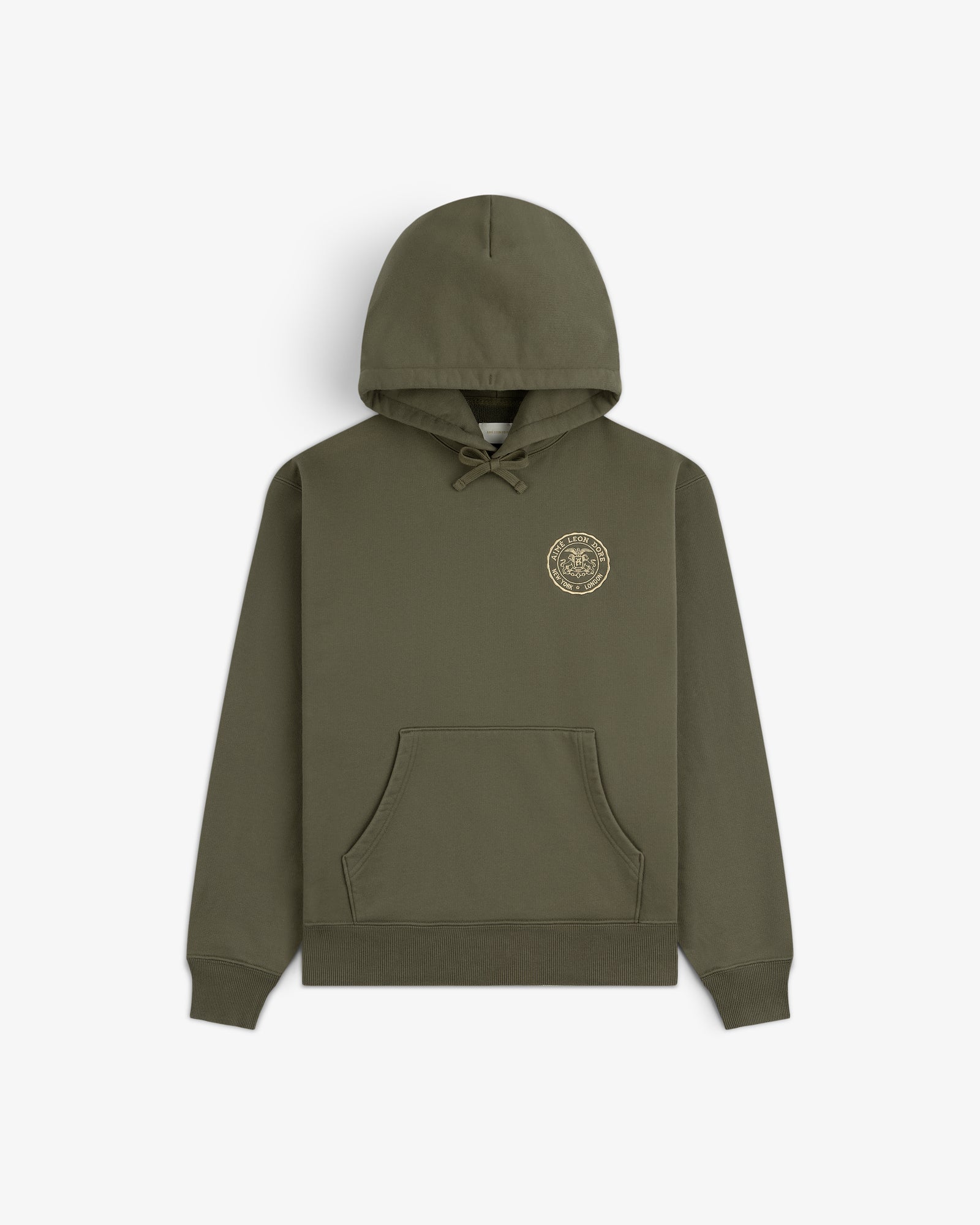 Signet Logo Hoodie in olive green with front pocket and small circular gold emblem on the left chest.