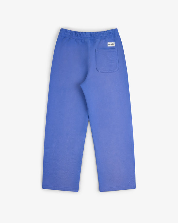 Sun Faded Sweatpants in bright blue with a textured finish, elastic waistband, and one back pocket, shown flat on white.
