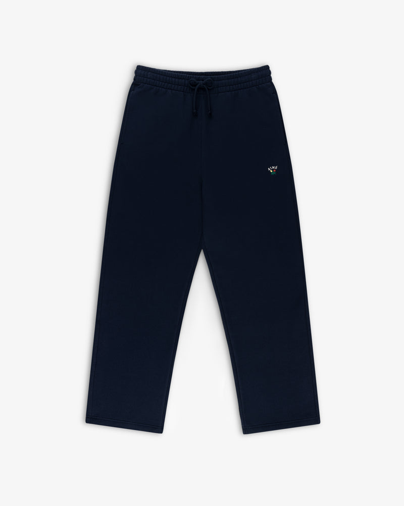 Navy Crest Sweatpants with drawstring waist and small logo on left thigh, shown flat on white background.