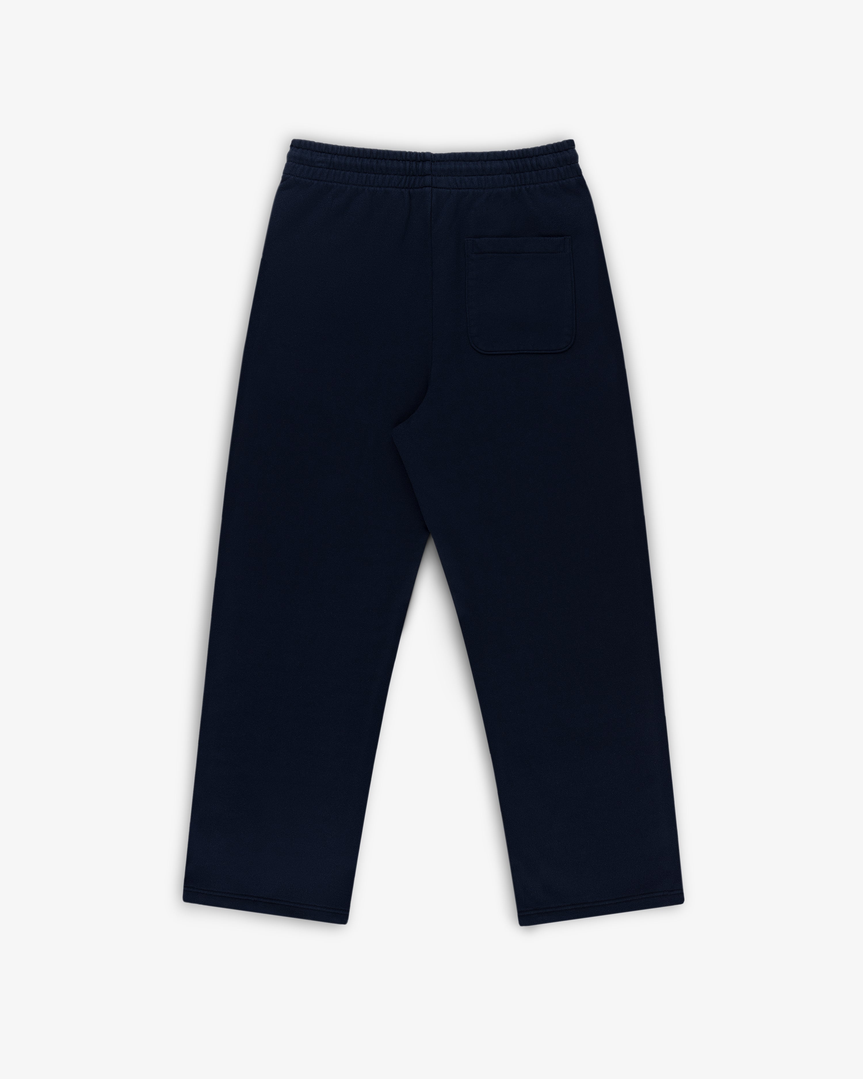 Crest Sweatpants in navy blue with an elastic waistband and one back pocket on a white background.