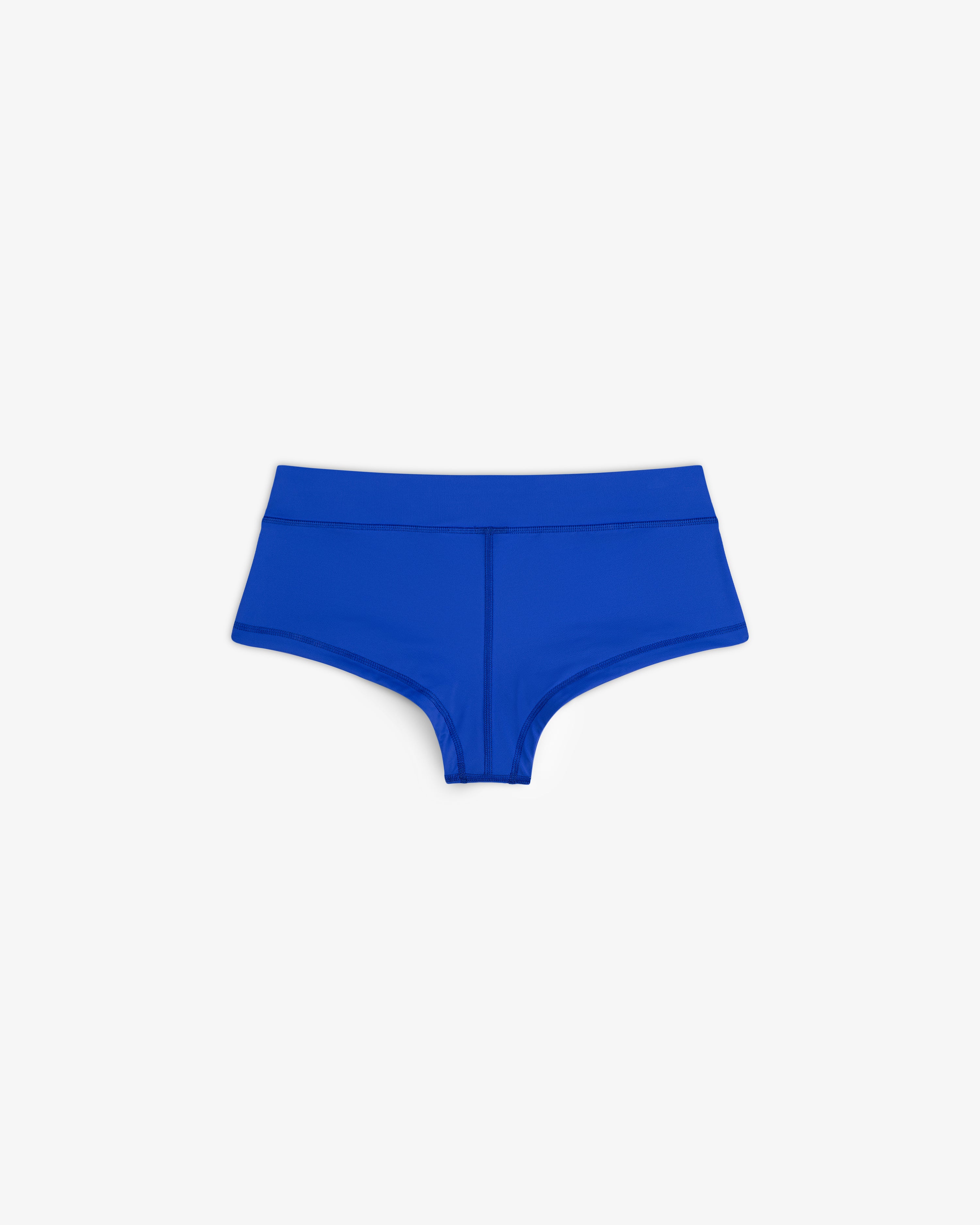 Bright blue Crest Swim Short, high-waisted women's bikini bottom laid flat on a white background.