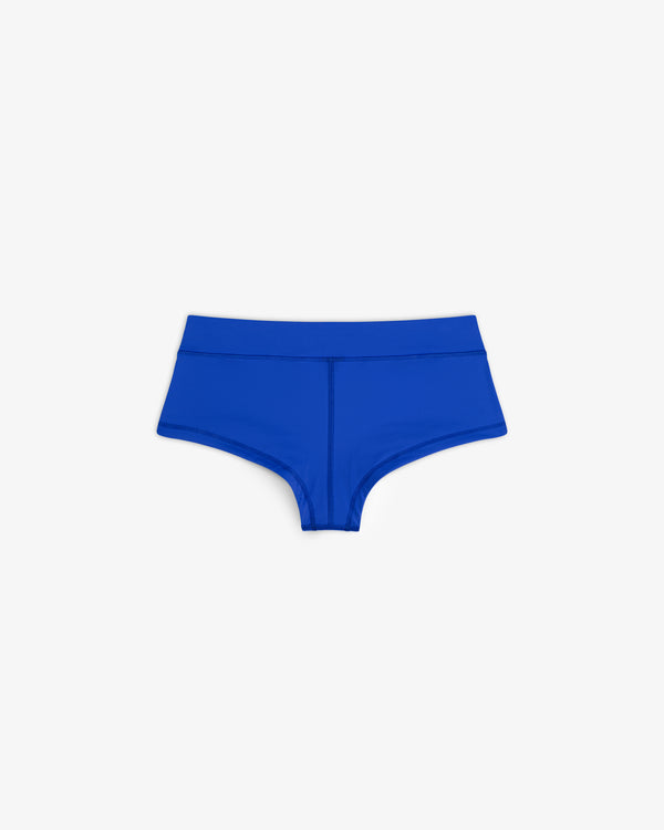 Bright blue Crest Swim Short, high-waisted women's bikini bottom laid flat on a white background.