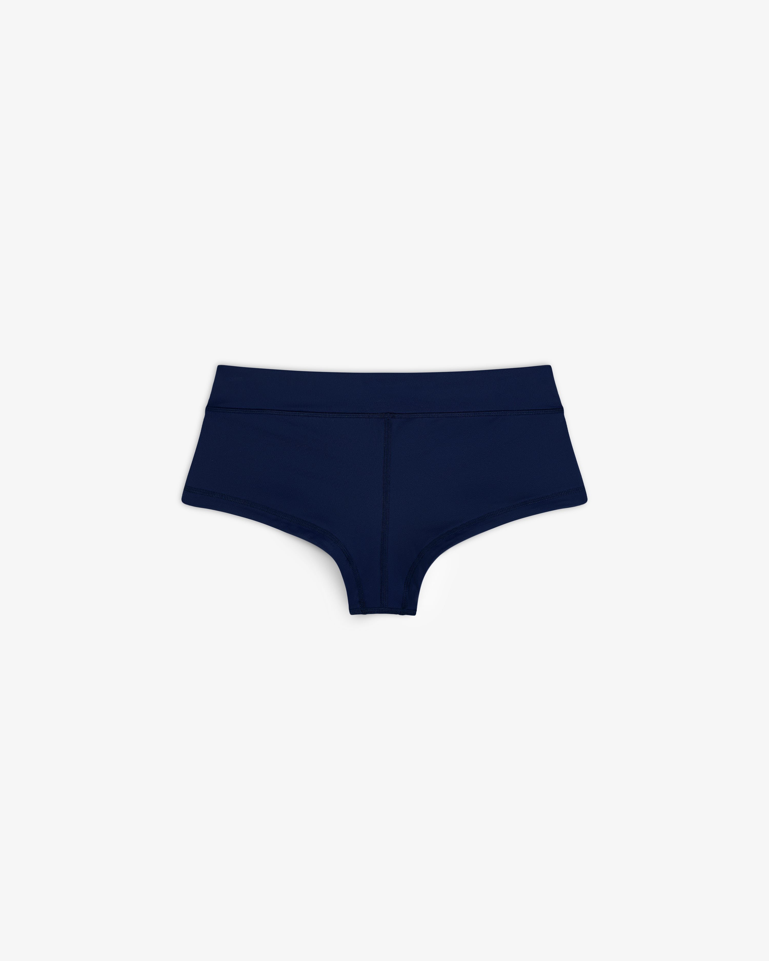 Navy blue Crest Swim Short high-waisted women's underwear laid flat on a white background.