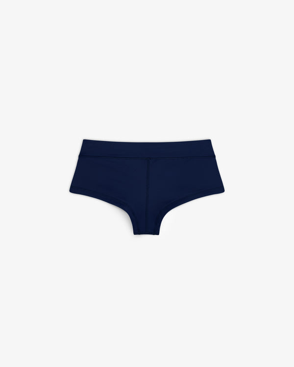 Navy blue Crest Swim Short high-waisted women's underwear laid flat on a white background.