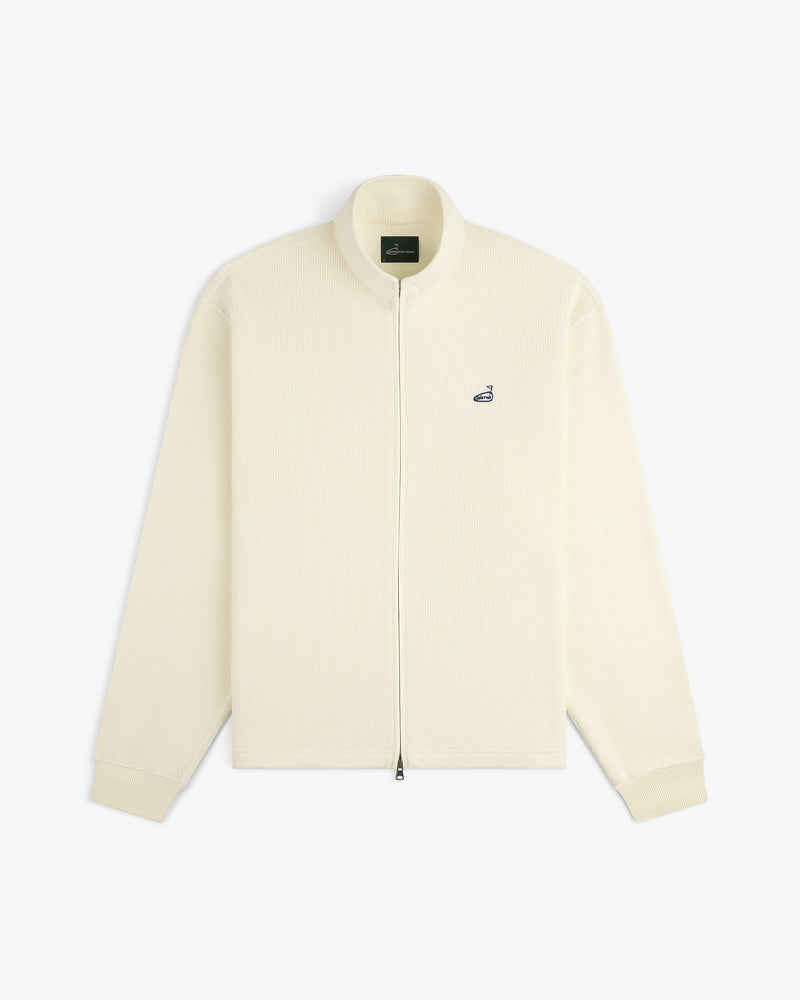 ALD Golf Piqué Full Zip Sweater in off-white with ribbed texture and small left chest logo, shown laid flat on white.
