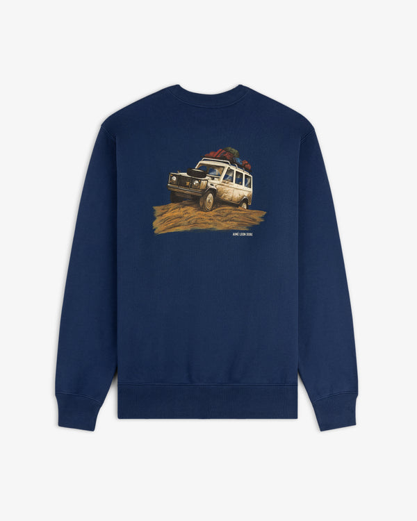 Safari Crewneck Sweatshirt featuring a graphic of an off-road vehicle with roof luggage driving on dirt.