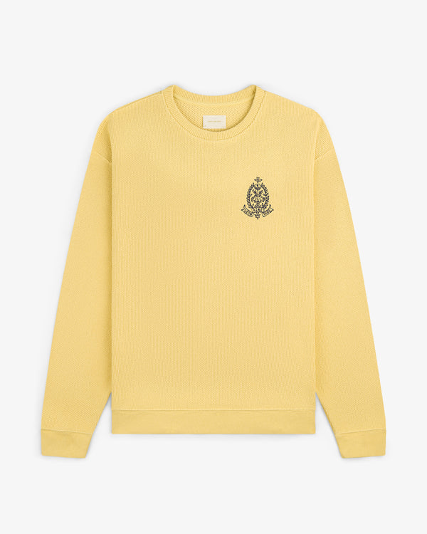 Saint George Piqué Crewneck Sweatshirt in yellow with a small black crest embroidered on the left chest.