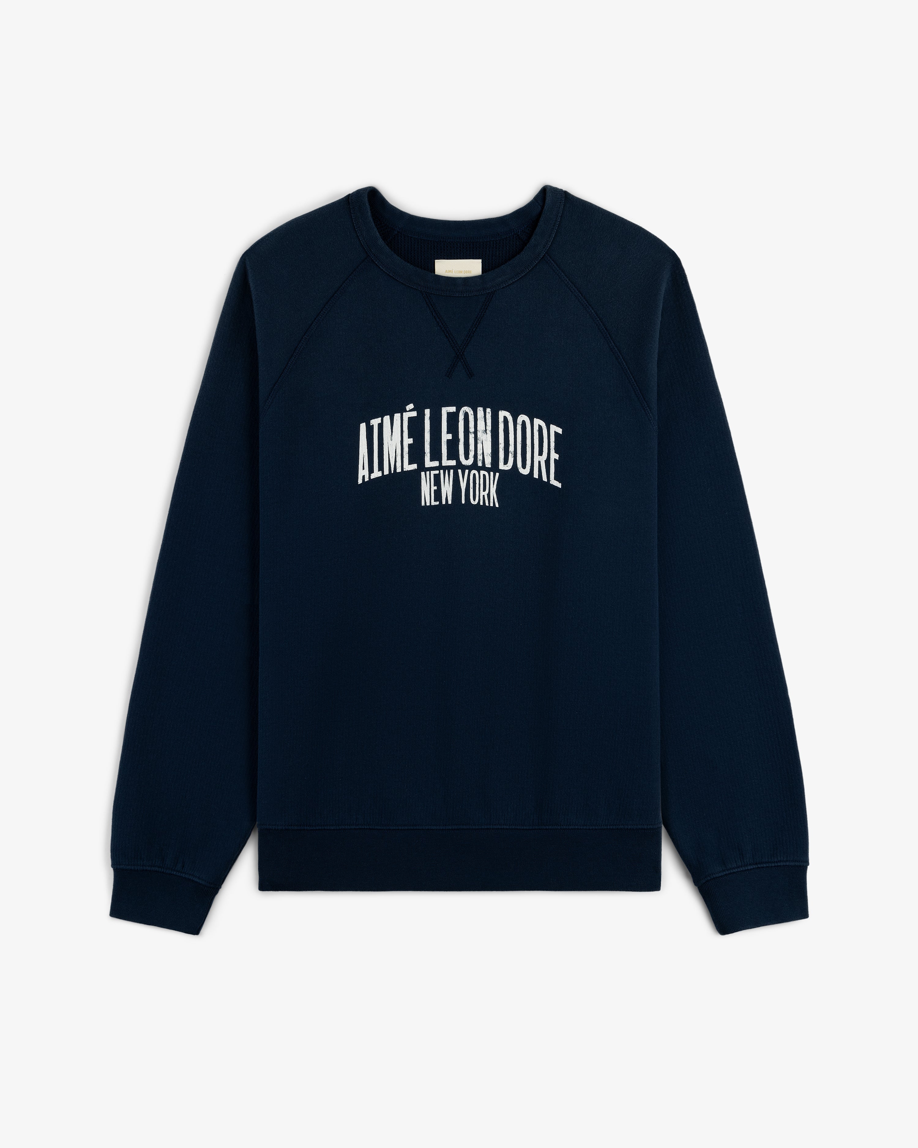 Vintage Washed Crewneck Sweatshirt in navy with white AIMÉ LEON DORE NEW YORK embroidery on the front.