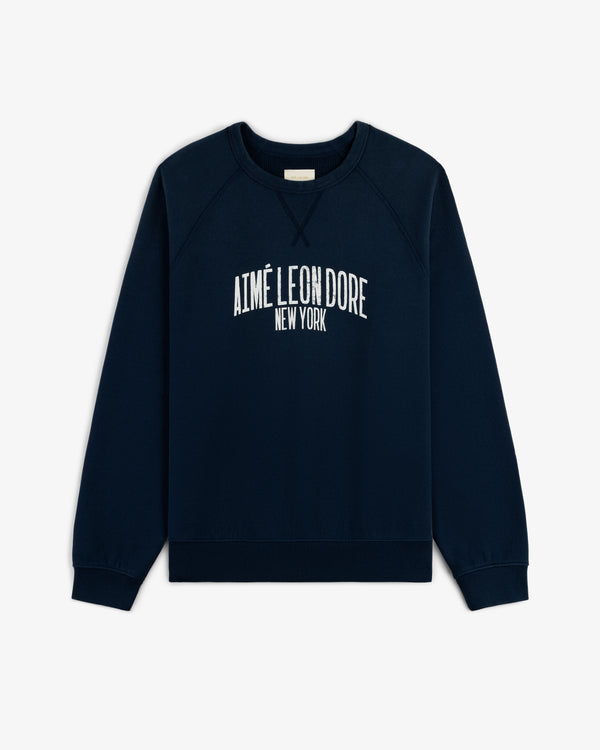 Vintage Washed Crewneck Sweatshirt in navy with white AIMÉ LEON DORE NEW YORK embroidery on the front.
