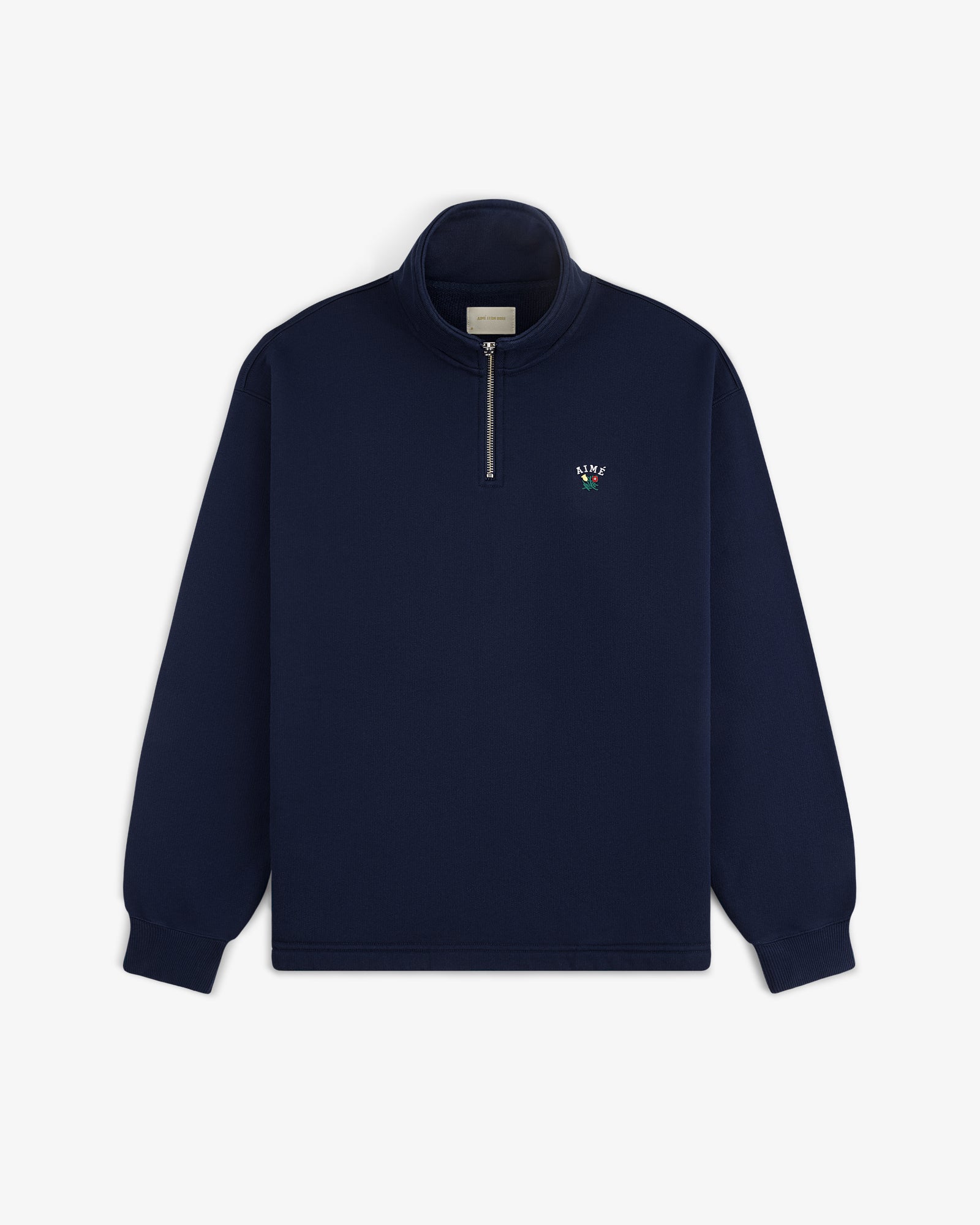 Crest Quarter Zip Pullover in navy blue with long sleeves and a small embroidered logo on the left chest.