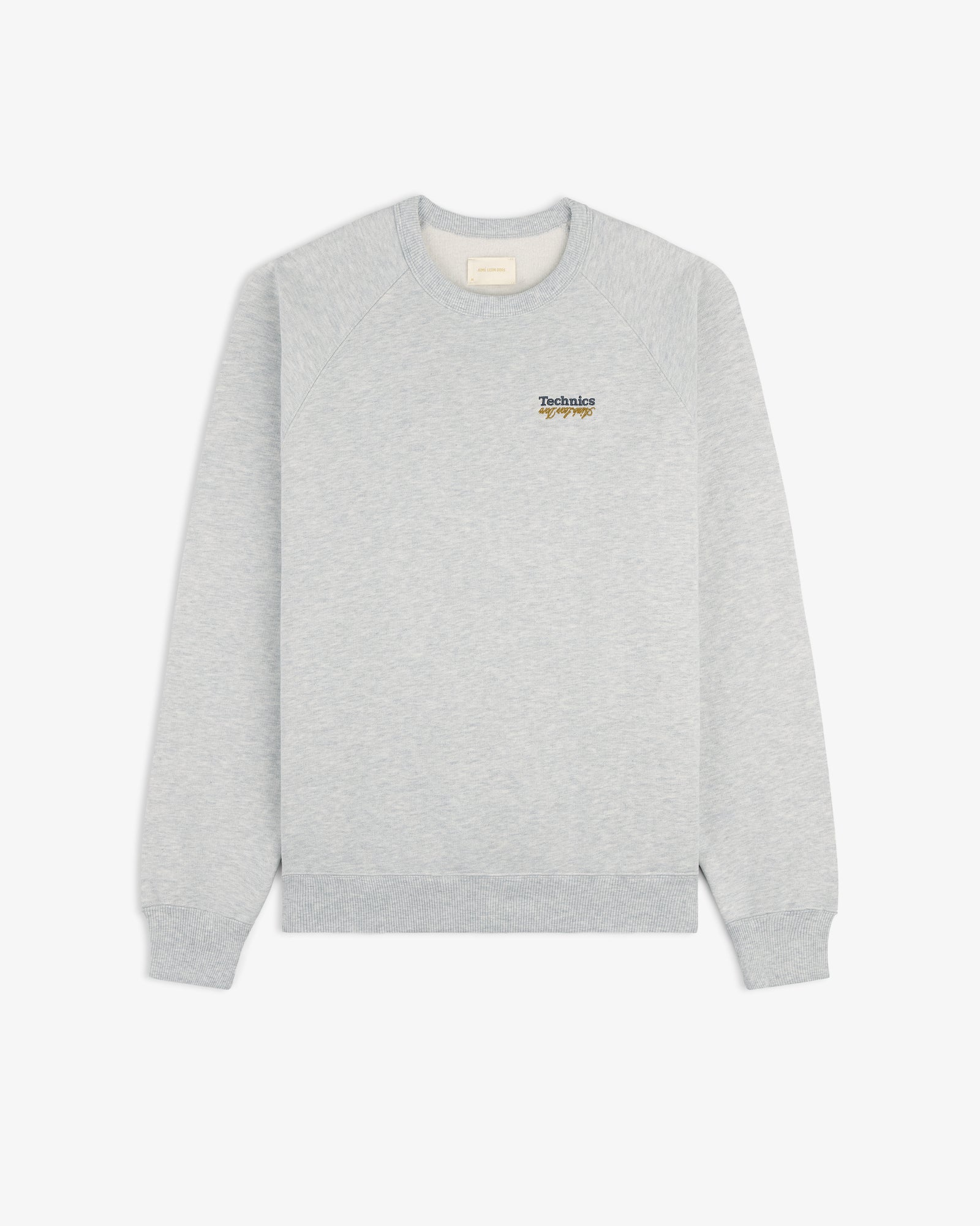 Light gray ALD / Technics World Champions Crewneck with small logo graphic on upper left chest, shown on white background.
