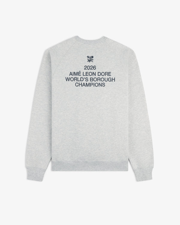 Light grey ALD / Technics World Champions Crewneck with "2026 Worlds Borough Champions" in navy blue on the back.