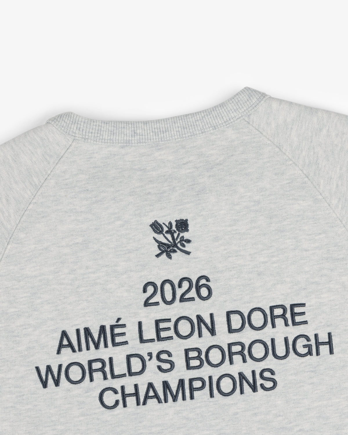 Light grey ALD / Technics World Champions Crewneck with “2026 AIMÉ LEON DORE WORLDS BOROUGH CHAMPIONS” and floral emblem.