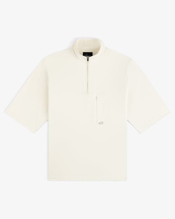ALD Golf Quarter Zip Pullover in off-white with short sleeves and a zippered chest pocket, shown on white background.