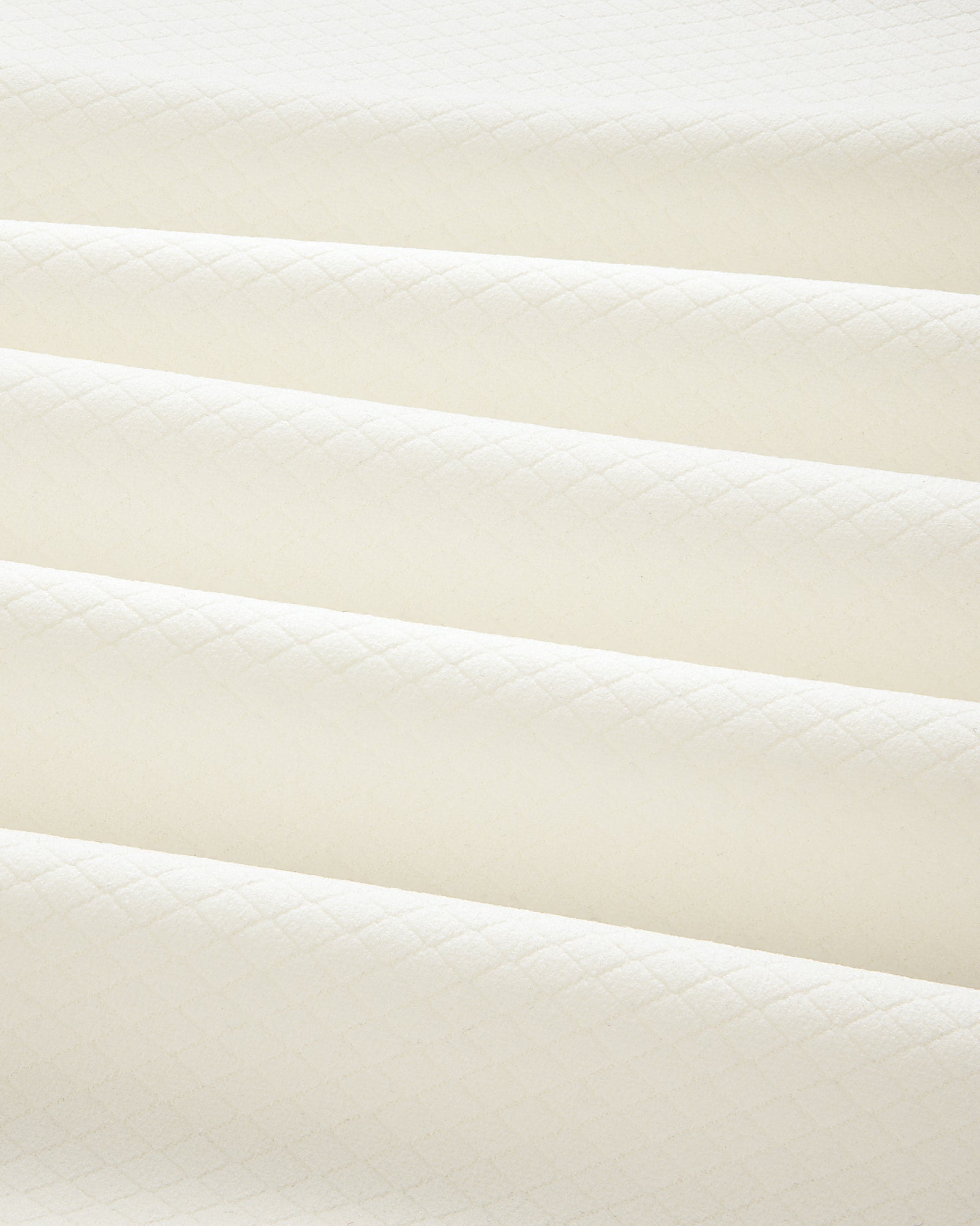 Cream-colored ALD Golf Quarter Zip Pullover in quilted fabric with a subtle diamond pattern and soft, even folds.