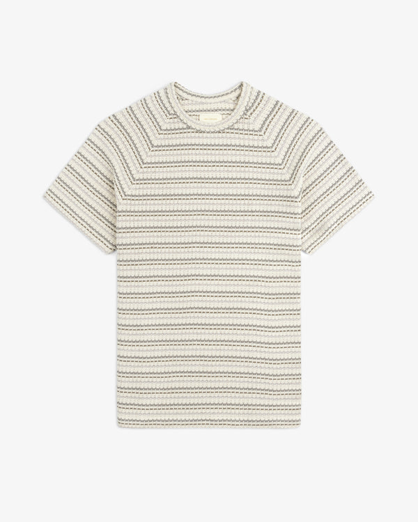 Jacquard Striped Tee: cream, short-sleeve with thin black and tan stripes and a textured knit pattern, laid flat.