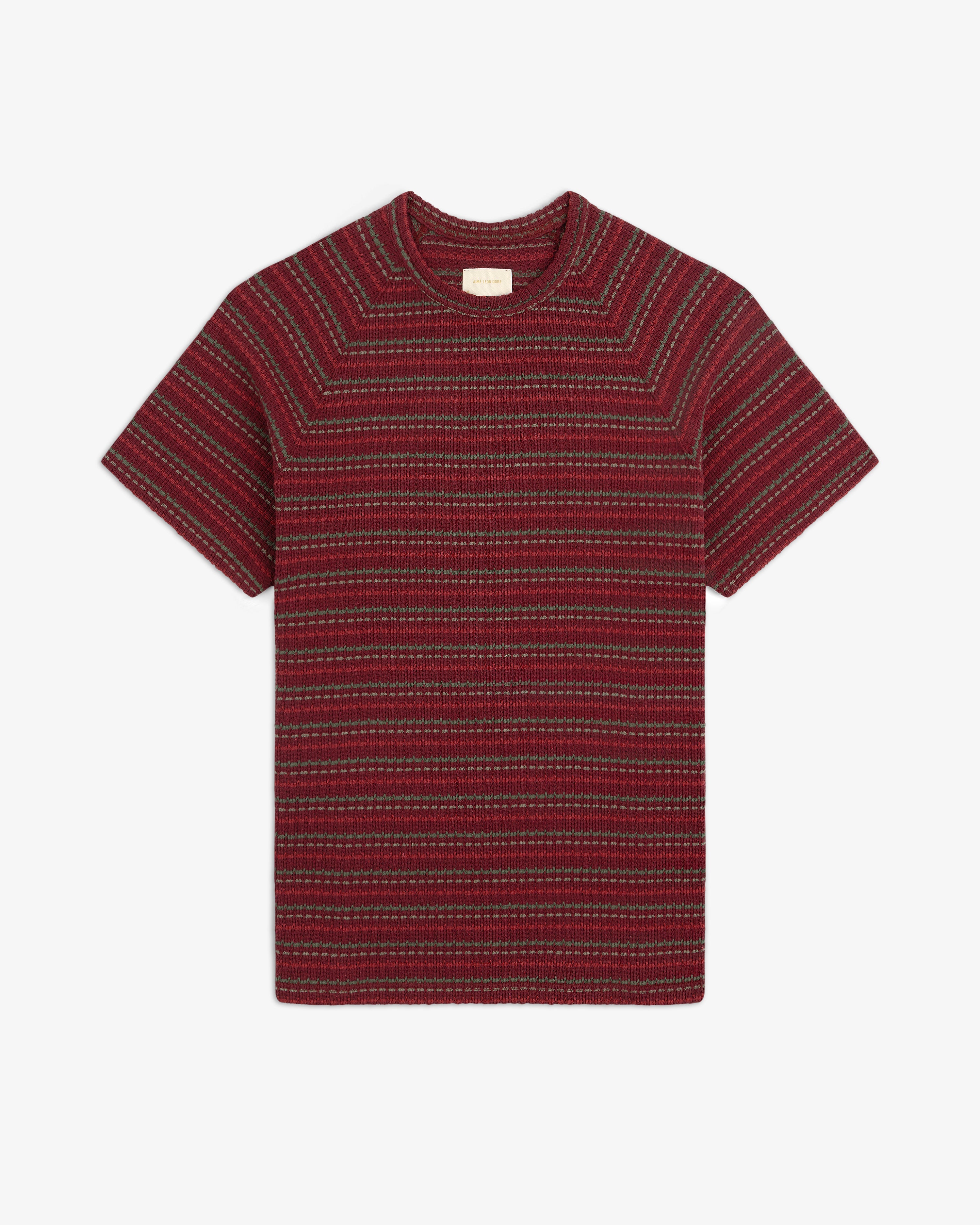 Jacquard Striped Tee in red with gray and black horizontal stripes, shown flat on a white background.