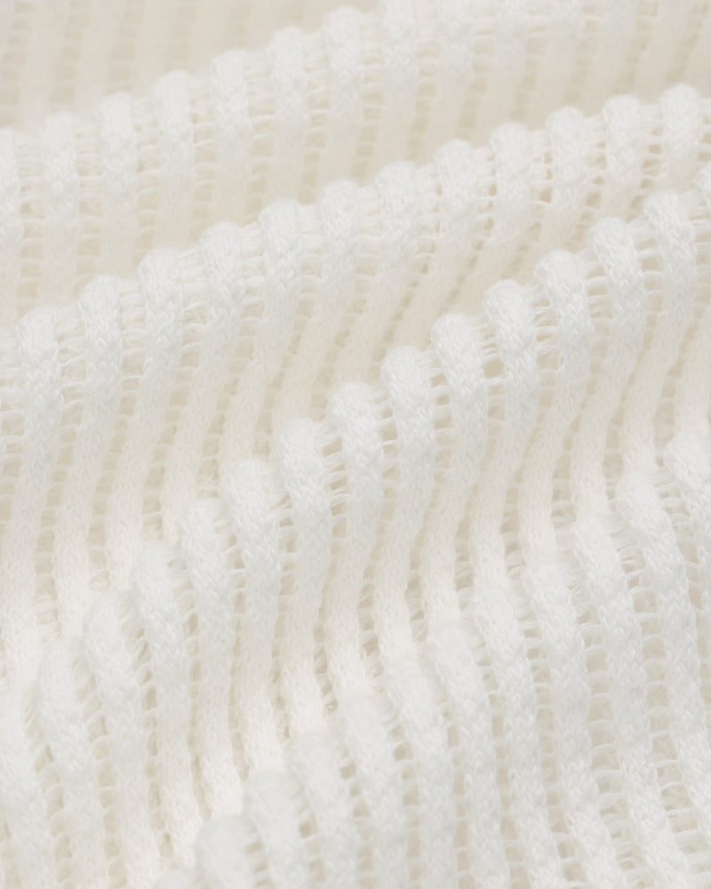 Close-up of Mesh V-Neck Tee in white, featuring ribbed knit texture with wavy horizontal ridges and soft material.