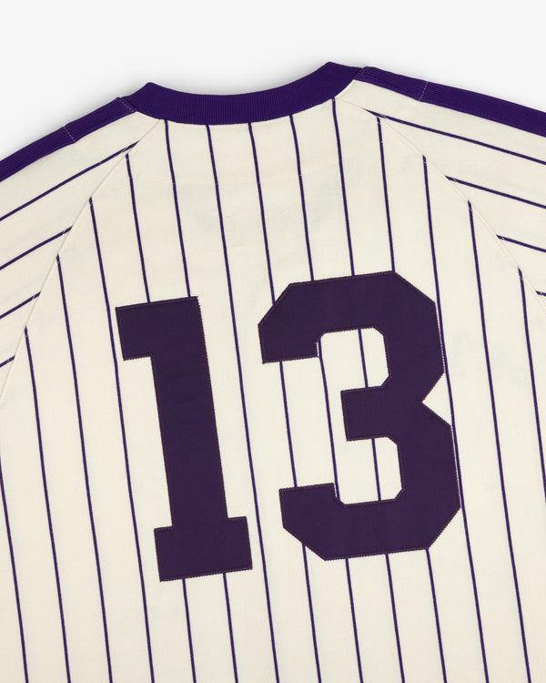 Aimé Baseball Jersey: white with thin navy stripes and large dark number 13 on the back.