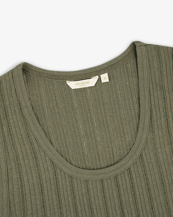 Close-up of the Drop Needle Tank Top in olive green with ribbed knit, round neckline, and visible size tag.
