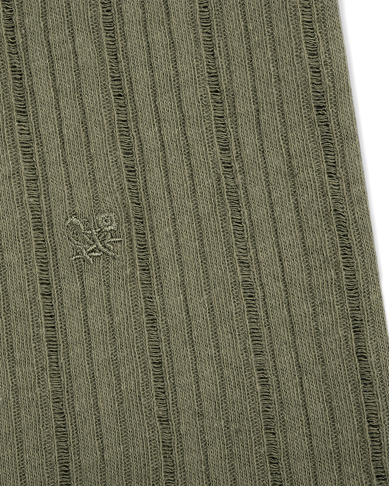 Close-up of olive green Drop Needle Tank Top's ribbed fabric with a small embroidered logo of two abstract shapes.
