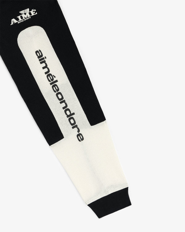 The Long-Sleeve Mesh Enduro Tee features black and white sleeves with aiméleondore text and an AIMÉ logo near the cuff.