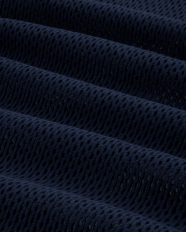 Close-up of dark blue Mesh Tank Top showing textured mesh fabric with small holes and horizontal folds.