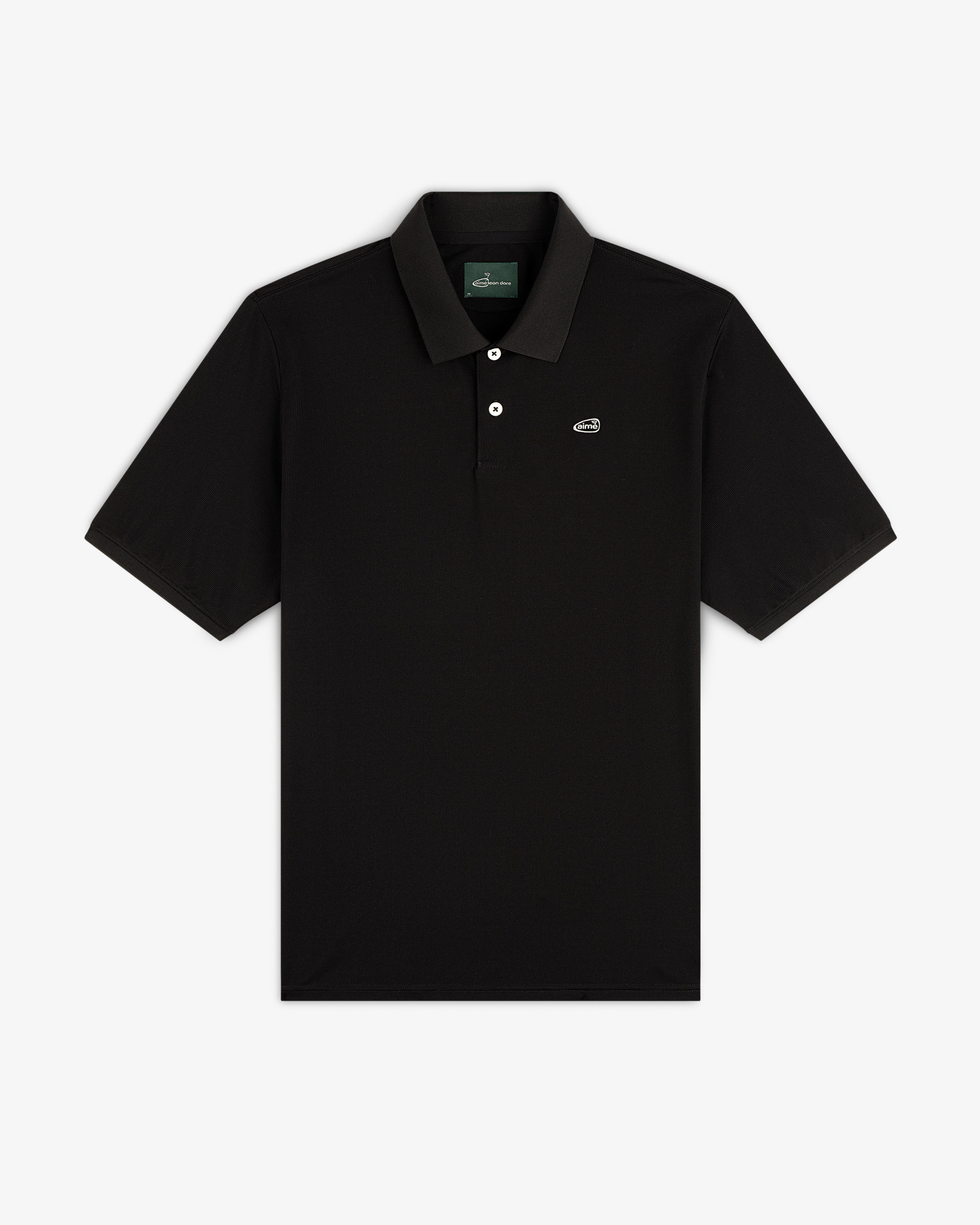 ALD Golf Polo: black short-sleeve shirt with collar, buttons, and small left-chest logo.