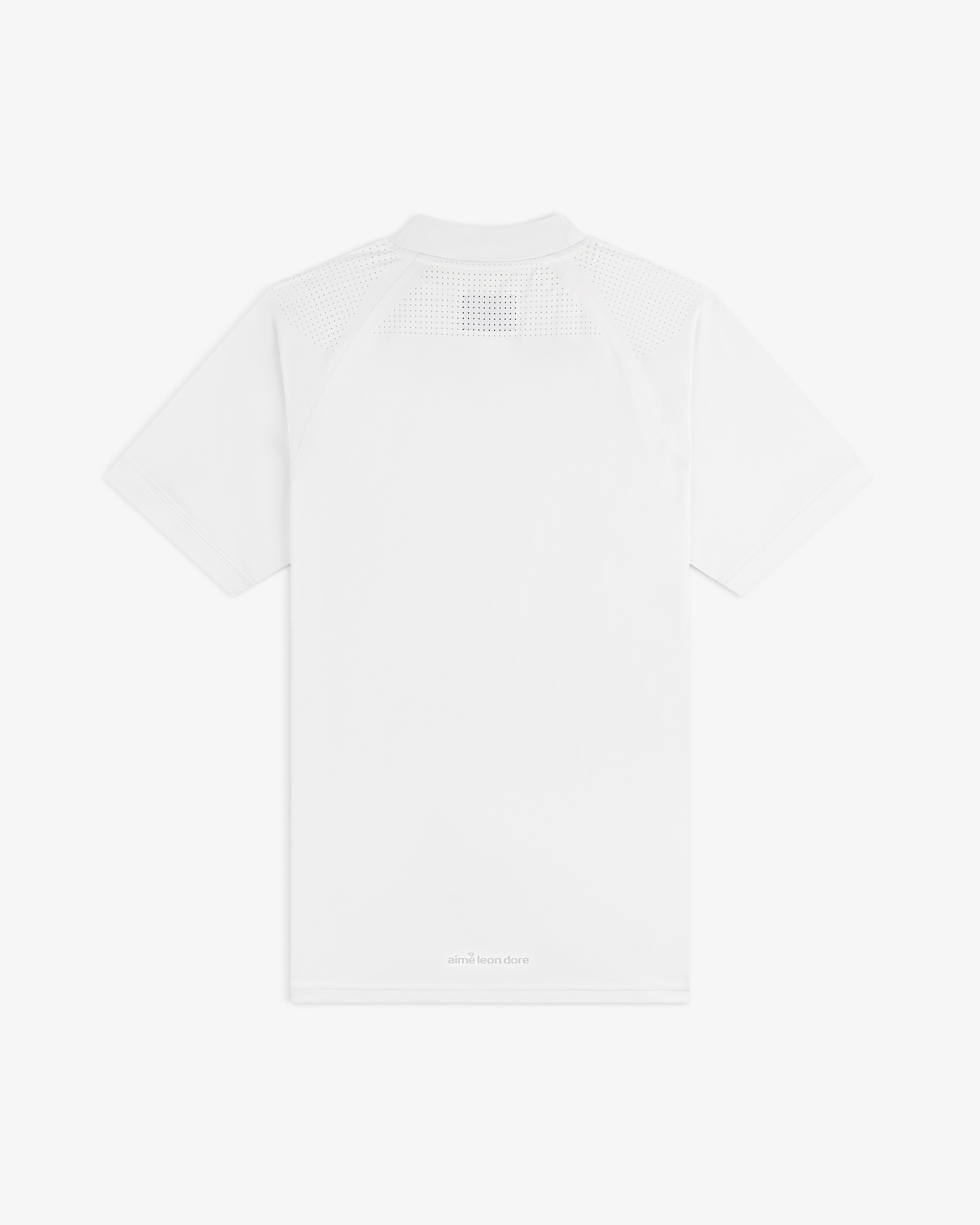 Back of the ALD Golf Performance Tee: plain white, mesh on upper shoulders, subtle text near the hem.