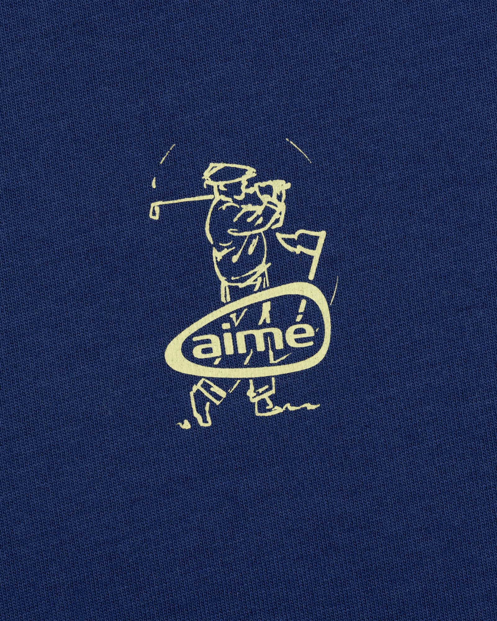 Line drawing of a golfer swinging on blue fabric, with "ALD Golf Swing Tee" in an oval below.