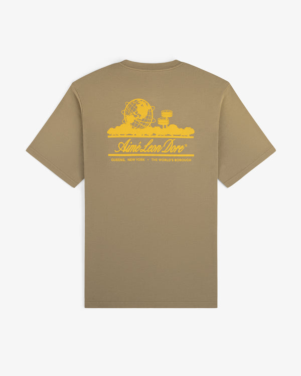 Sun Faded Unisphere Tee in khaki with a yellow globe and buildings graphic on back, Aimé Leon Dore text below.