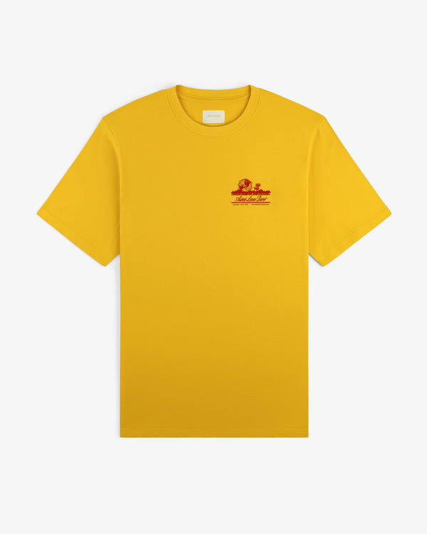 Sun Faded Unisphere Tee—yellow short-sleeve shirt with small red graphic and text on left chest, on white background.