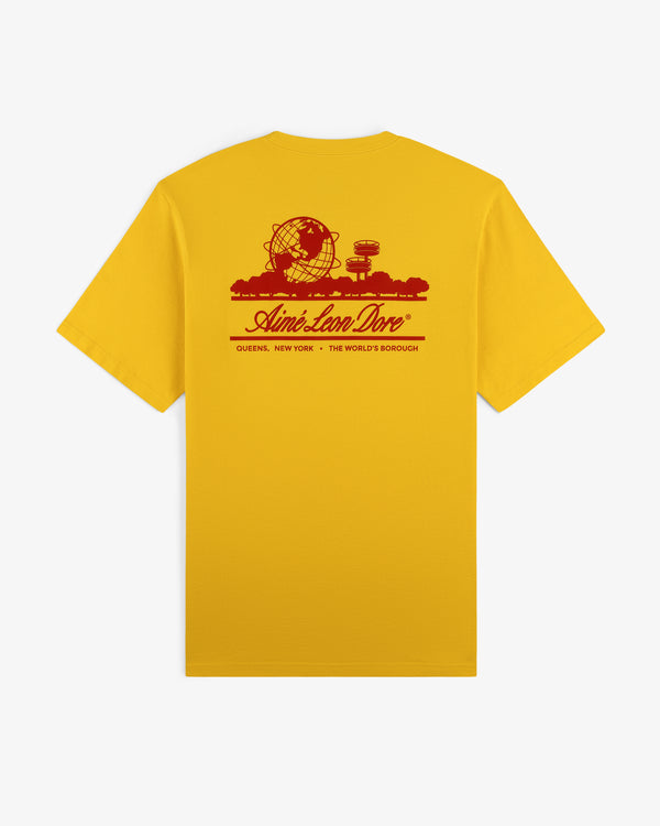 Sun Faded Unisphere Tee: yellow tee featuring a red Unisphere graphic and "Aimé Leon Dore, Queens, New York" text.