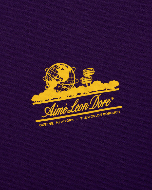 Sun Faded Unisphere Tee: Yellow Unisphere graphic and Aimé Leon Dore text on purple with Queens, NY below.