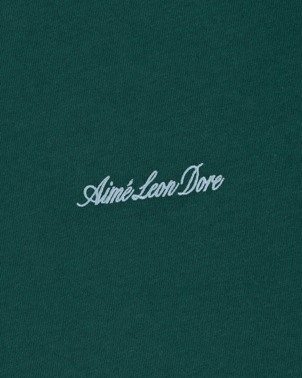 Green Embroidered Logo Tee featuring Aimé Leon Dore in white cursive at the center.