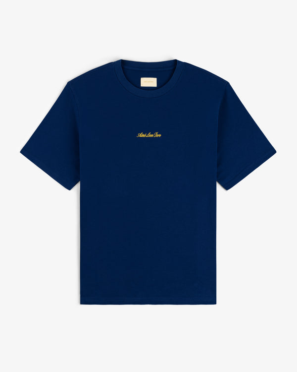 Navy Embroidered Logo Tee with short sleeves and small gold text centered on the chest.