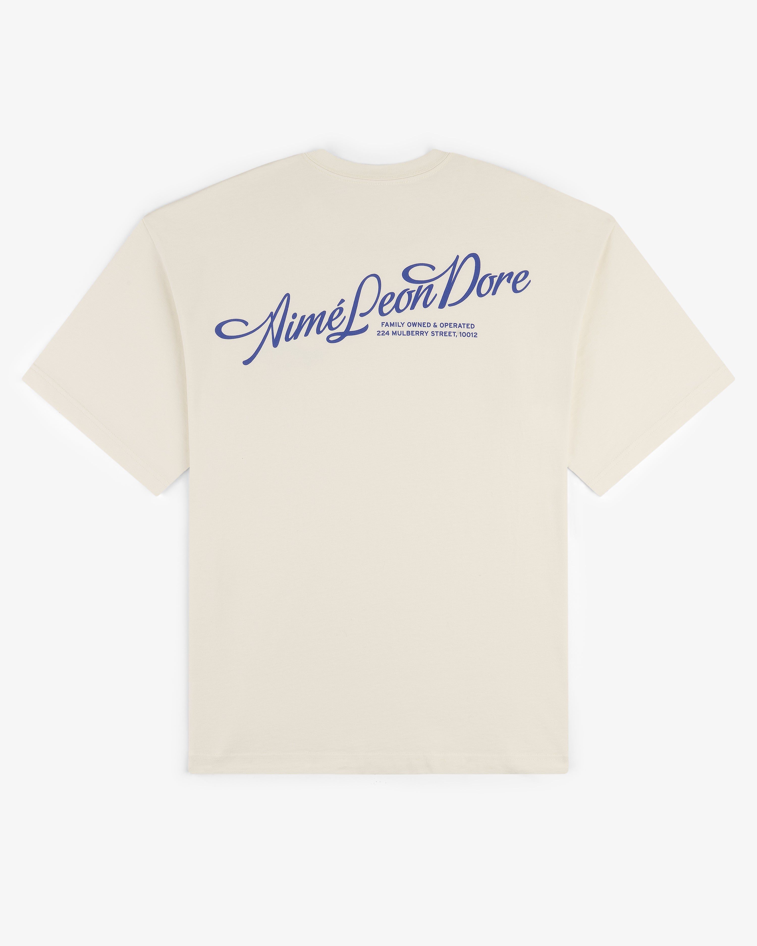 Beige Pappoús Logo Tee with Aimé Leon Dore logo and blue script text printed on the back near the shoulders.