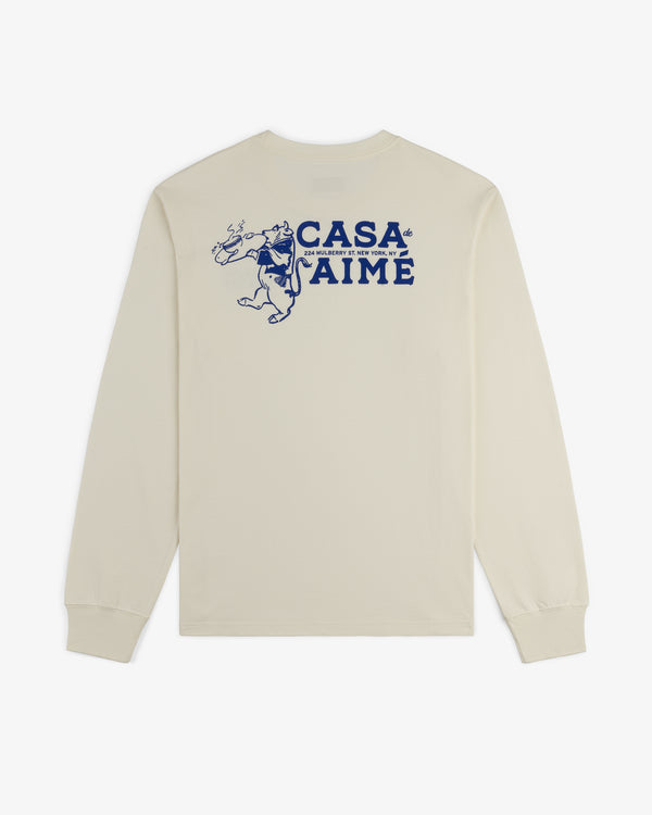 Back of the Long-Sleeve Casa Tee in cream with blue “CASA AIME” text and a dancing figure graphic holding a drink.
