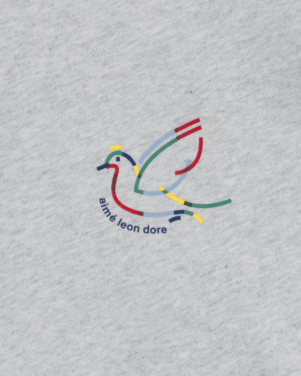 Colorful dove outline above "aime leon dore" on light gray fabric, Long-Sleeve Souvenir Tee.