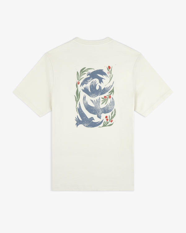 Woodblock Dove Tee: White tee with blue birds and green leaves with red berries in a circular pattern on the back.