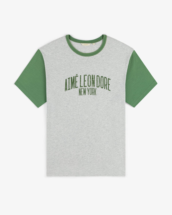Washed Ringer Tee in gray with green sleeves and AIMÉ LEON DORE NEW YORK printed in green on the front.