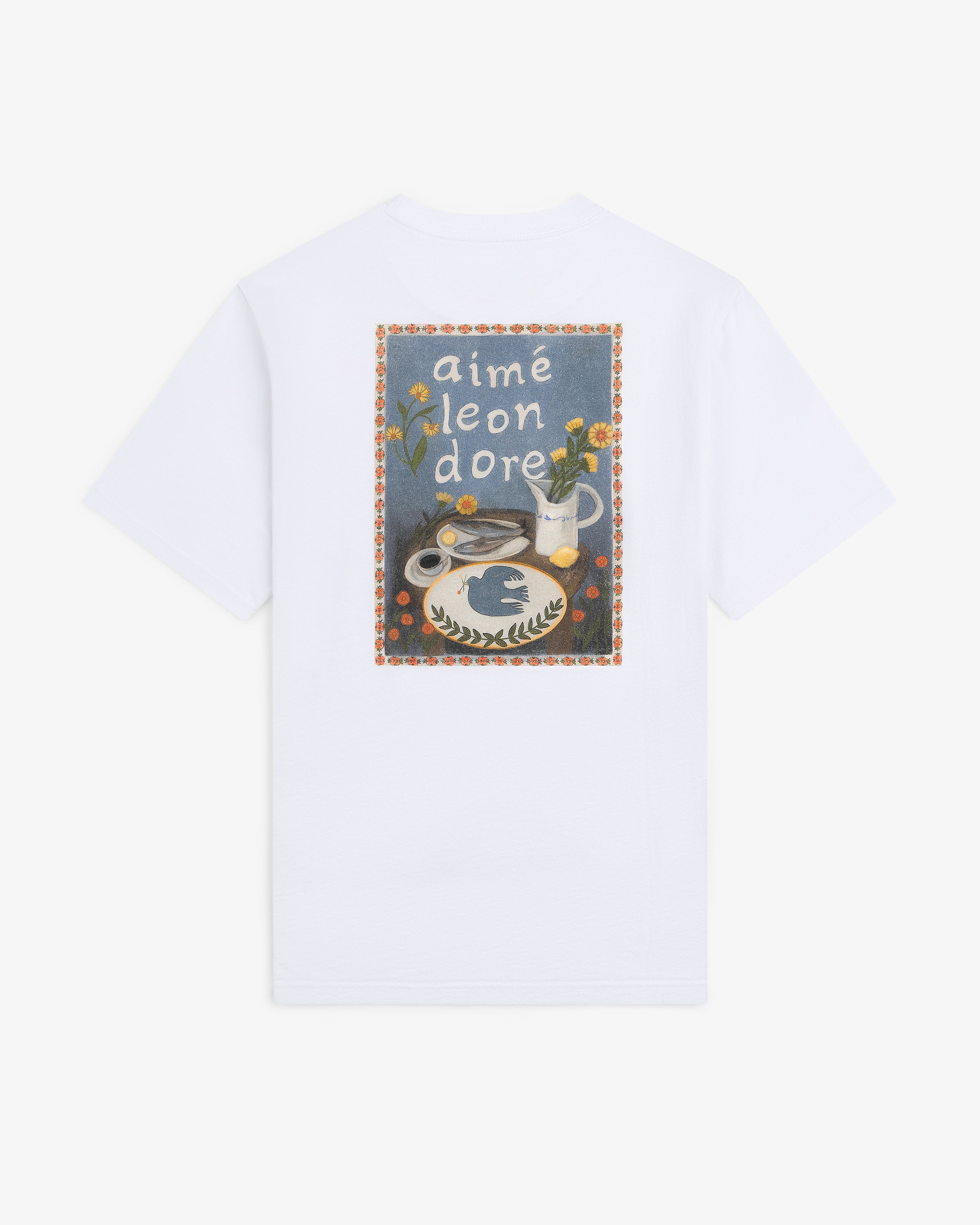The Breakfast Tee is a white t-shirt with a colorful graphic and Aimé Leon Dore text on the back.