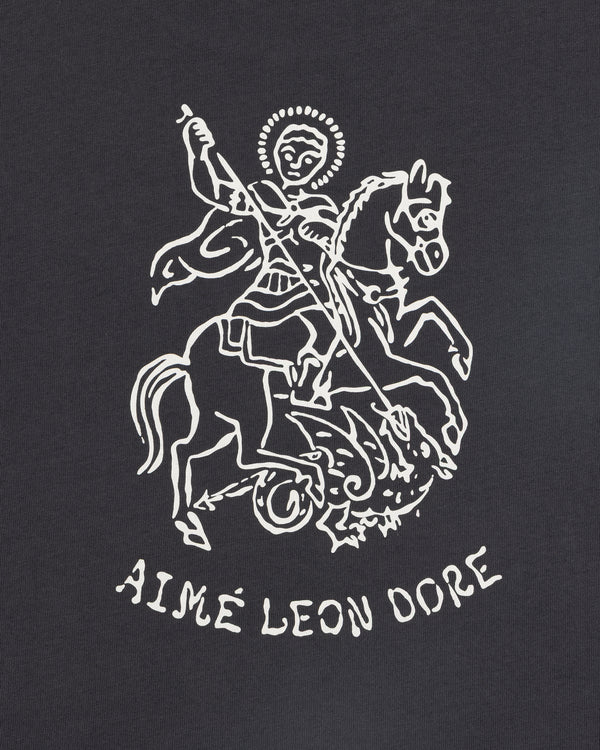 Line drawing of Saint George slaying a dragon on horseback with SAINT GEORGE GRAPHIC TEE below.